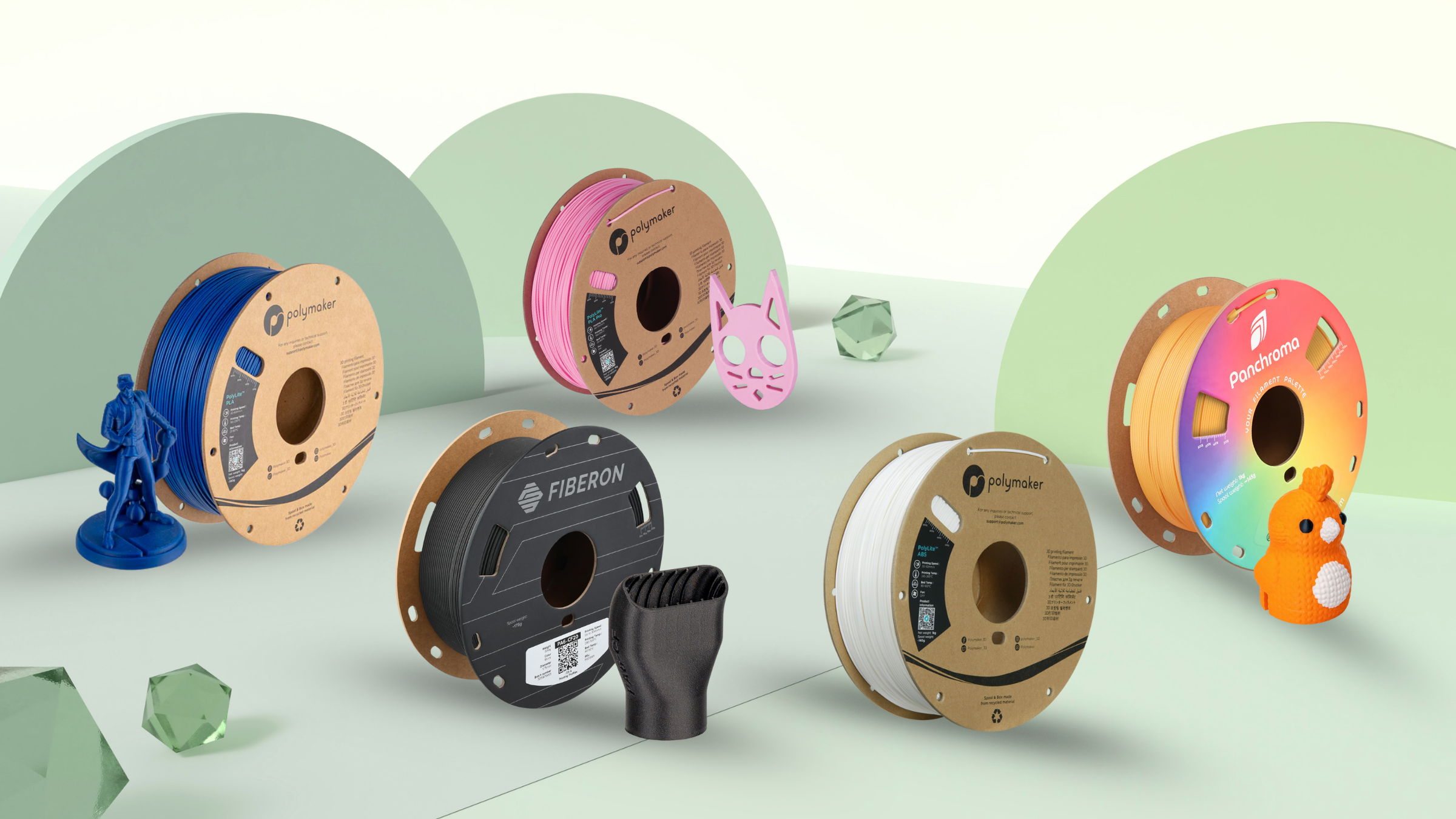 Polymaker filament collection featuring specialty and standard colors with creative 3D printed models